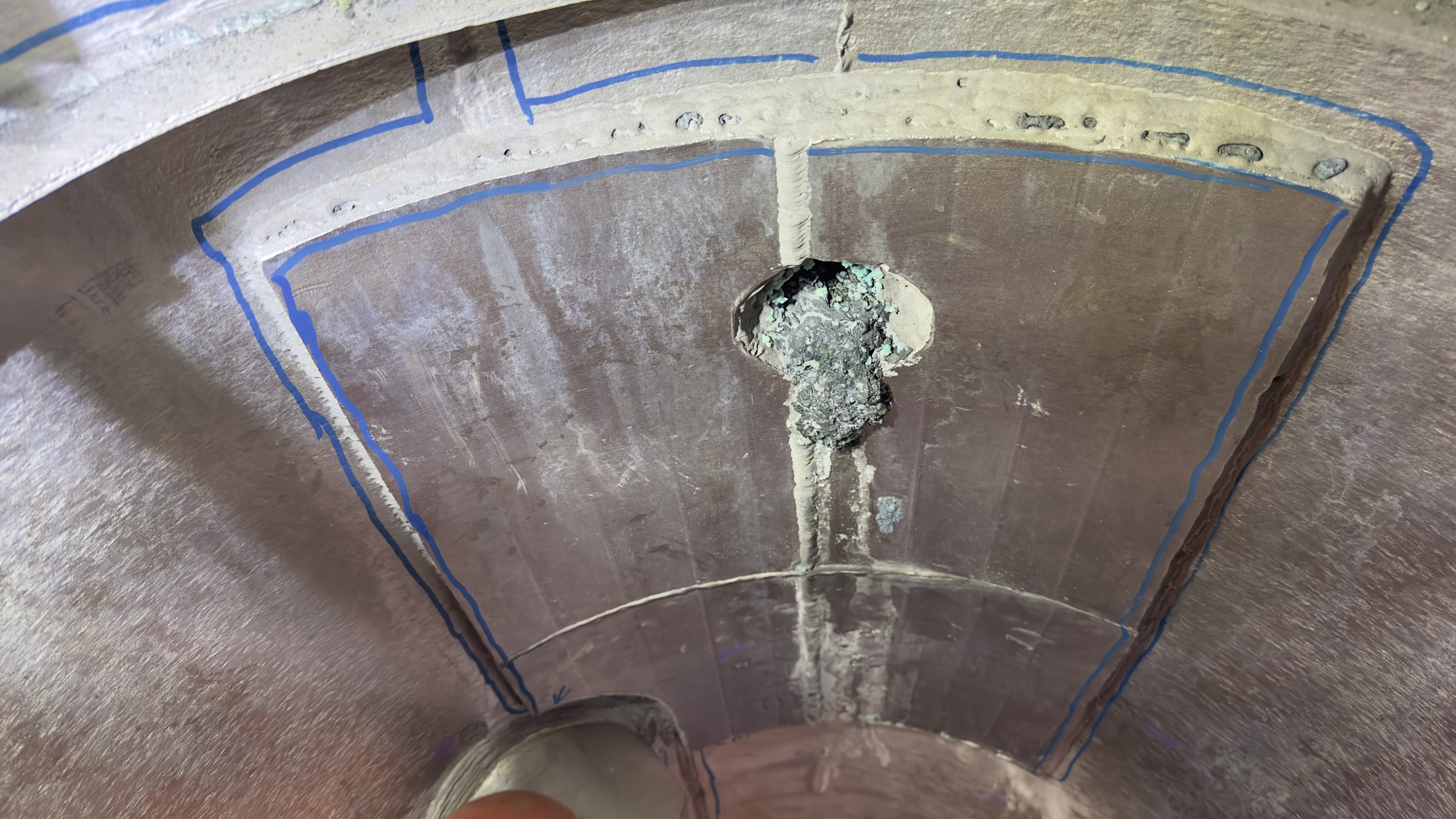 Corrosion perforation identified during a visual inspection of a vessel interior