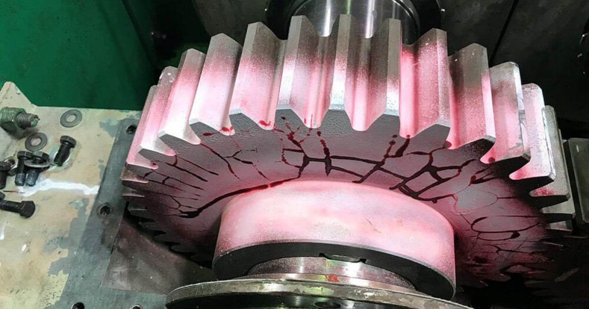 Magnetic particle indication found on a machined component during fabrication inspection