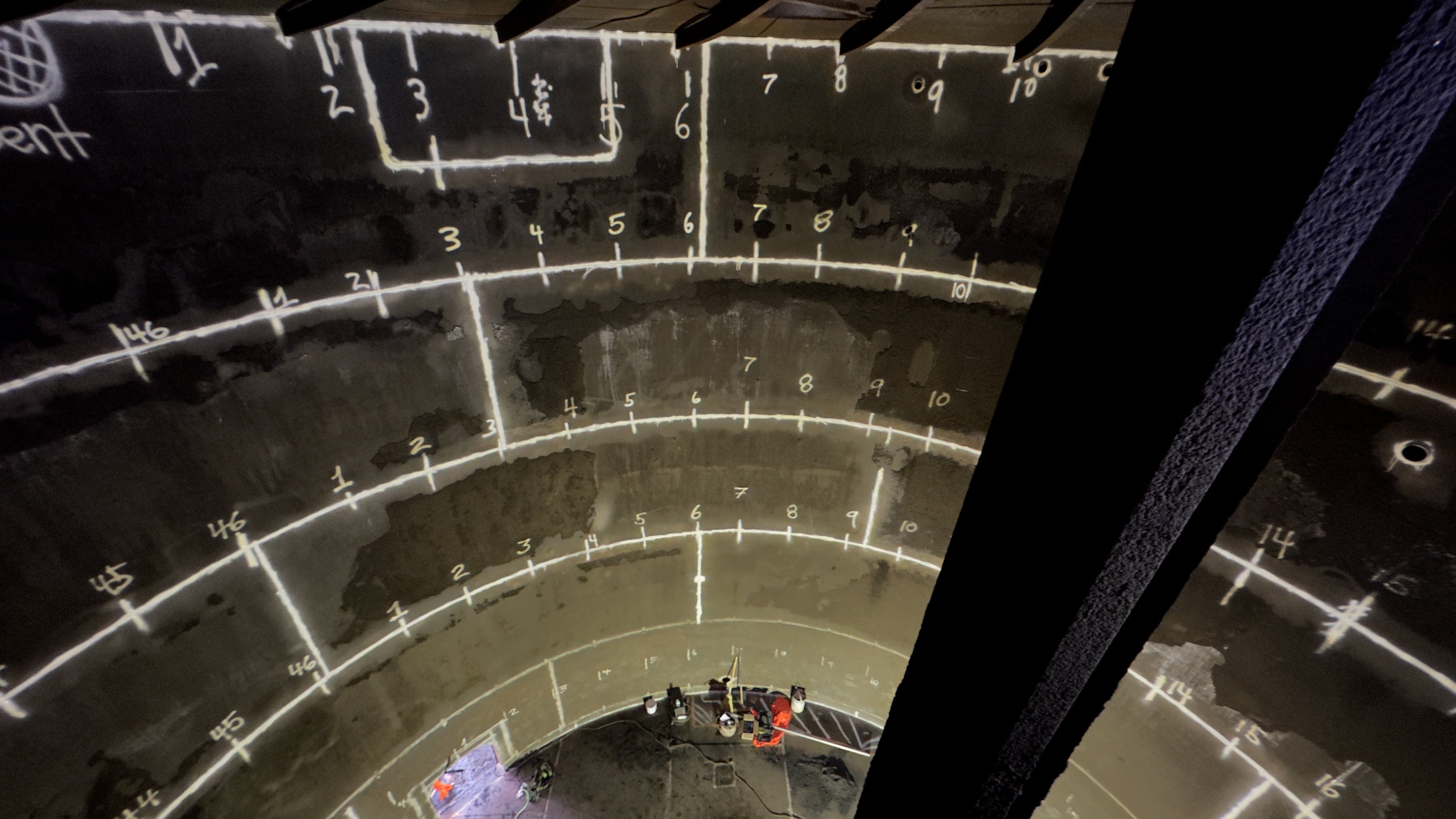 Grid-marked internal surface of an industrial vessel prepared for inspection measurements